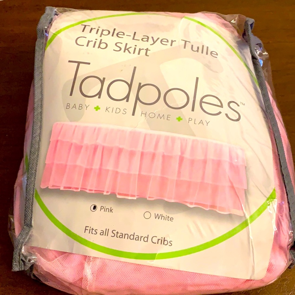 Pink tulle crib skirt.